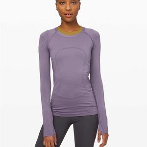 Two lulu lemon long sleeves in pink & purple (size small)!